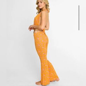 Beach bunny Saddie orange floral gold chain pants